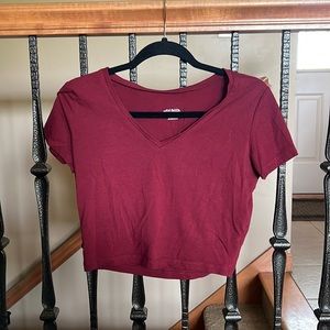Cropped V neck t-shirt. Maroon color. Size large. Hardly if ever worn